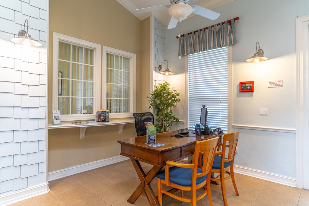 clubhouse with table and chairs with a cafe feel