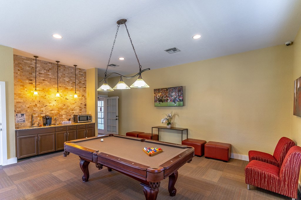 Clubhouse with pool table and tv