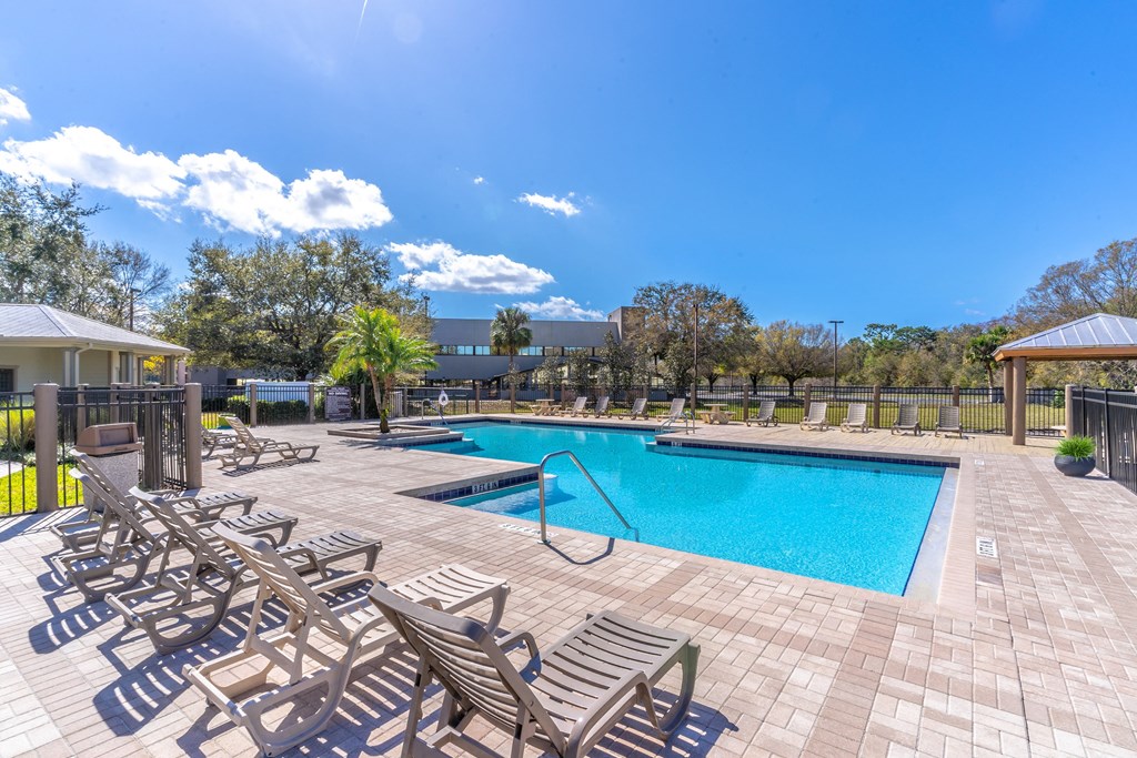 Resort-Style Pool with chairs