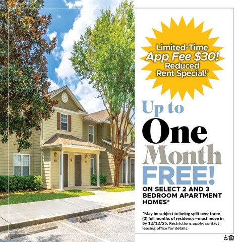 A house with a sign offering a free month on select 2 and 3 bedroom apartments.