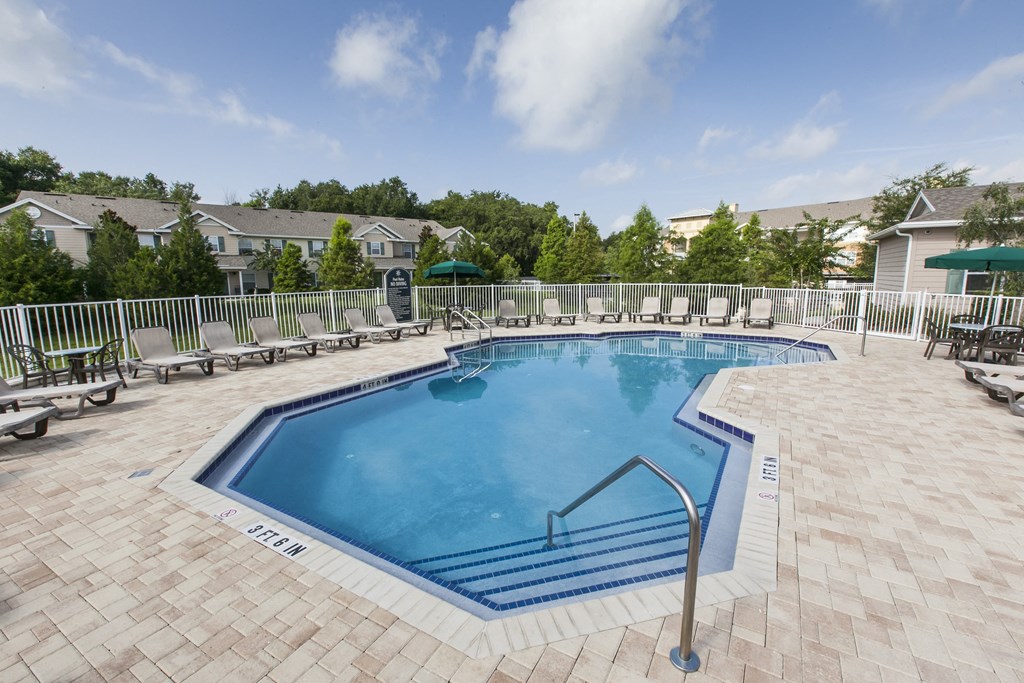 our apartments have a resort style pool with lounge chairs