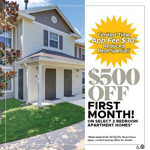 A house with a sign offering a $500 off first month on select 2 bedroom apartment homes.