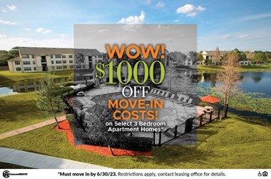 a graphic of the move in costs for a new apartment home with a lake in the background