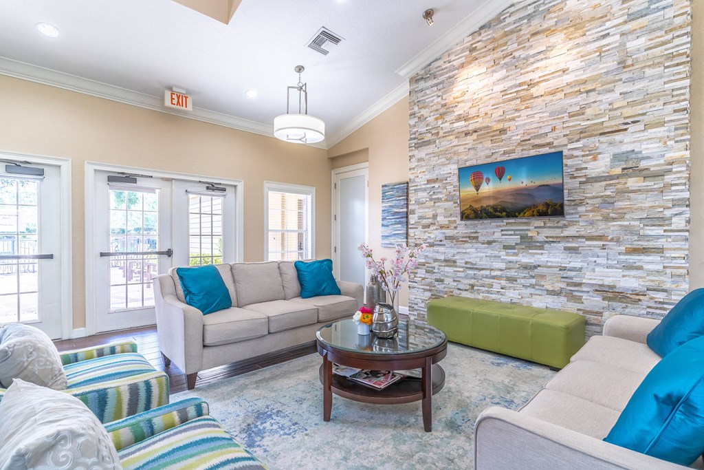 clubhouse area with couches and tv