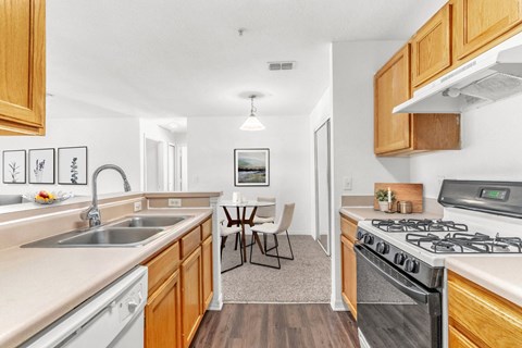 a kitchen and dining area in a 555 waverly unit