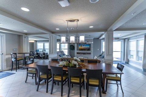 clubhouse with tables and tv
