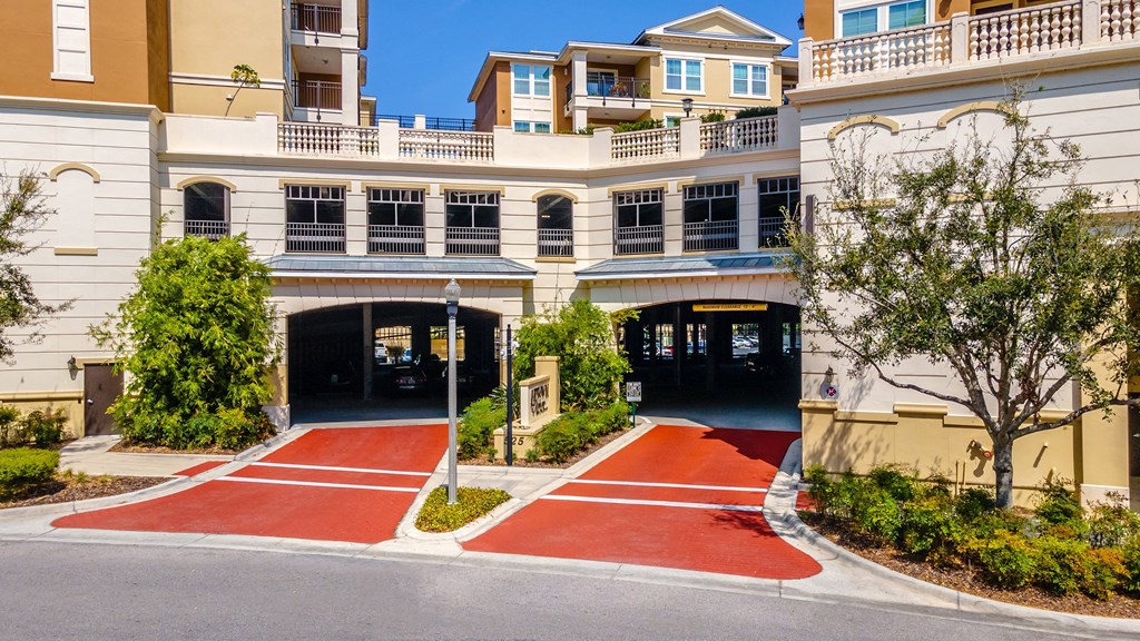a building with a red walkway in front of it