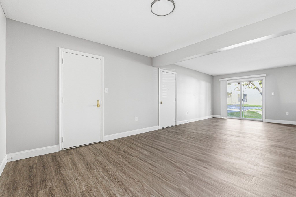 A room with wooden flooring at Hidden Brook Apartment Homes, New Bedford, MA
