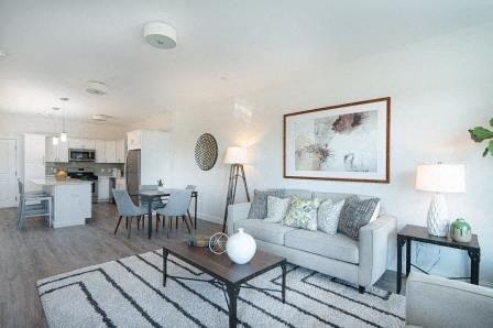 a living room with a couch and a table