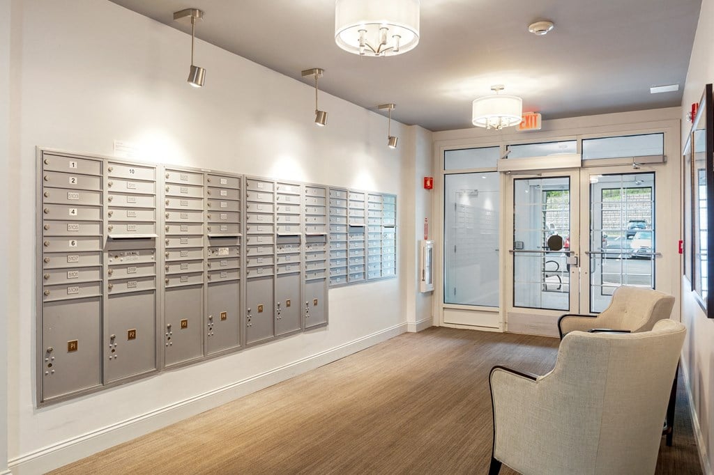 a view of the mail room atrium at the preserve at livonia apartments