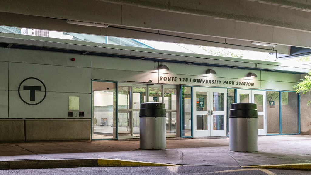 the entrance to the front of a building with the entrance doors to theorem d