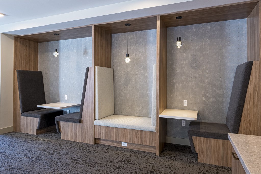 a rendering of a restaurant with two booths and two tables and lights