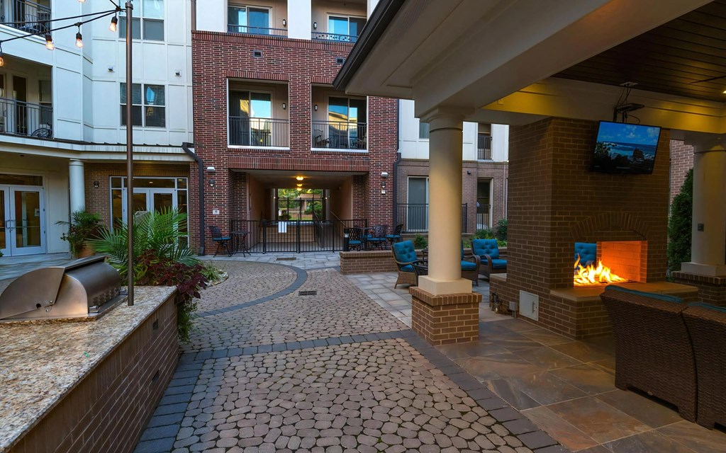 Courtyard with Seating and Fireplace at 401 Oberlin, Raleigh, 27605