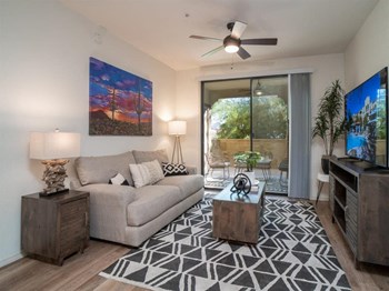 San Diego CA Apartments - Open Space Living Room Showing Plenty of Natural Light With Hardwood Floor and Stylish Interiors - Photo Gallery 3