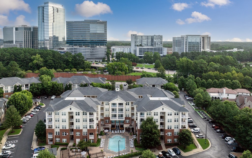 Aerial View of Allister North Hills Featuring Resort-Style Pool and Surface Lot Parking