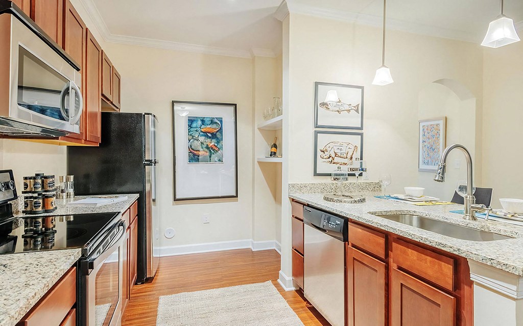 Galley Kitchen with Granite Countertops