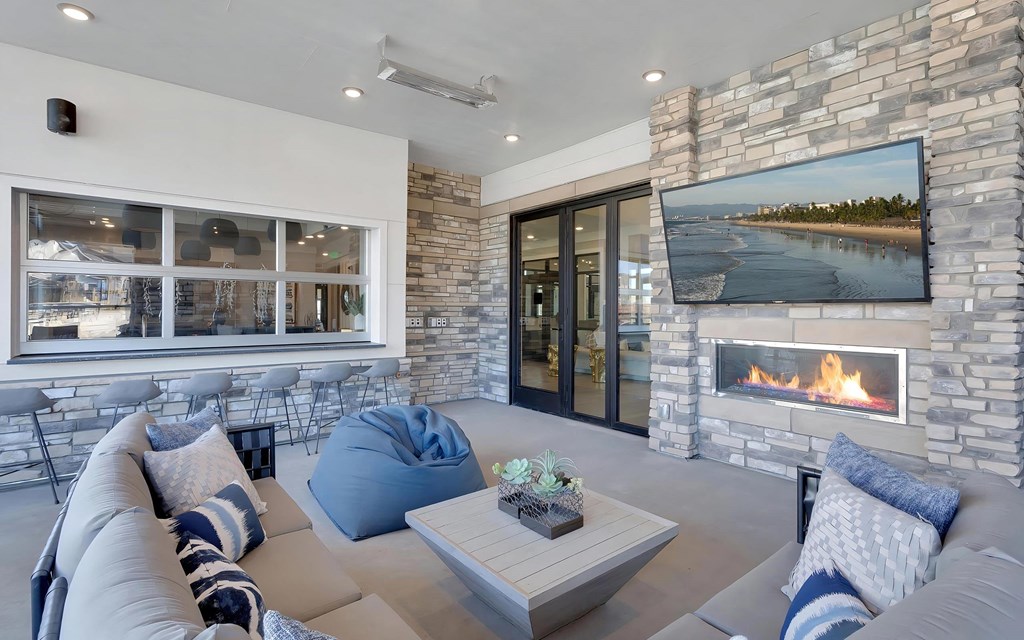 Outdoor Patio with Lounge Seating and TV