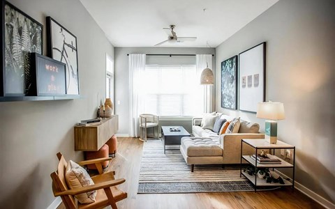 a living room with a couch and a tv