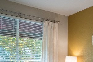 Window blinds in bedroom Window blinds in bedroom at Amerige Pointe Apartments, Fullerton, CA, 92833 - Photo Gallery 6