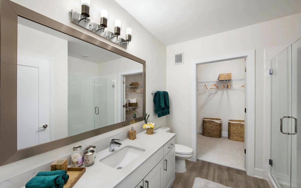 Spacious Bathrooms with Walk In Closets