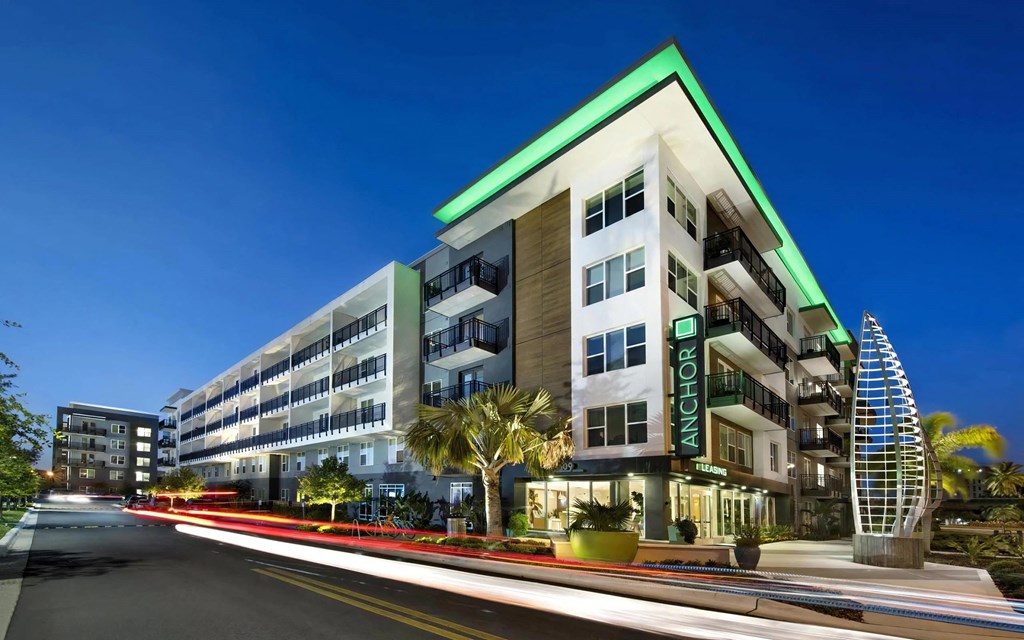View of Building in Evening with Sign