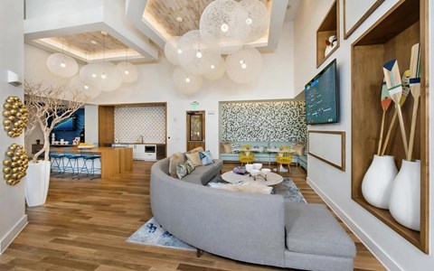 Community Lounge with TV, Kitchenette, and Contemporary Decor Accents