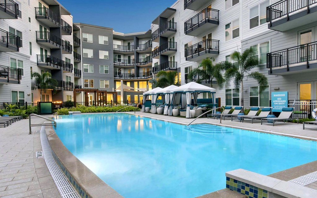Resort Style Pool with Loungers and Cabanas