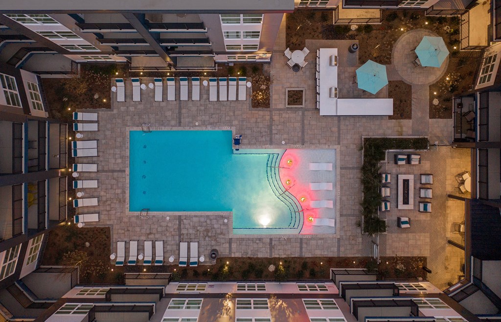 NoDa Flats Aerial View of Courtyard Pool Area with Lounge Seating and Cabanas