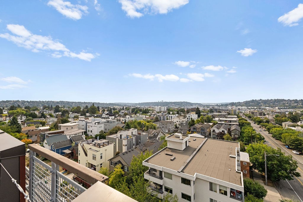 A cityscape with buildings and a clear sky.