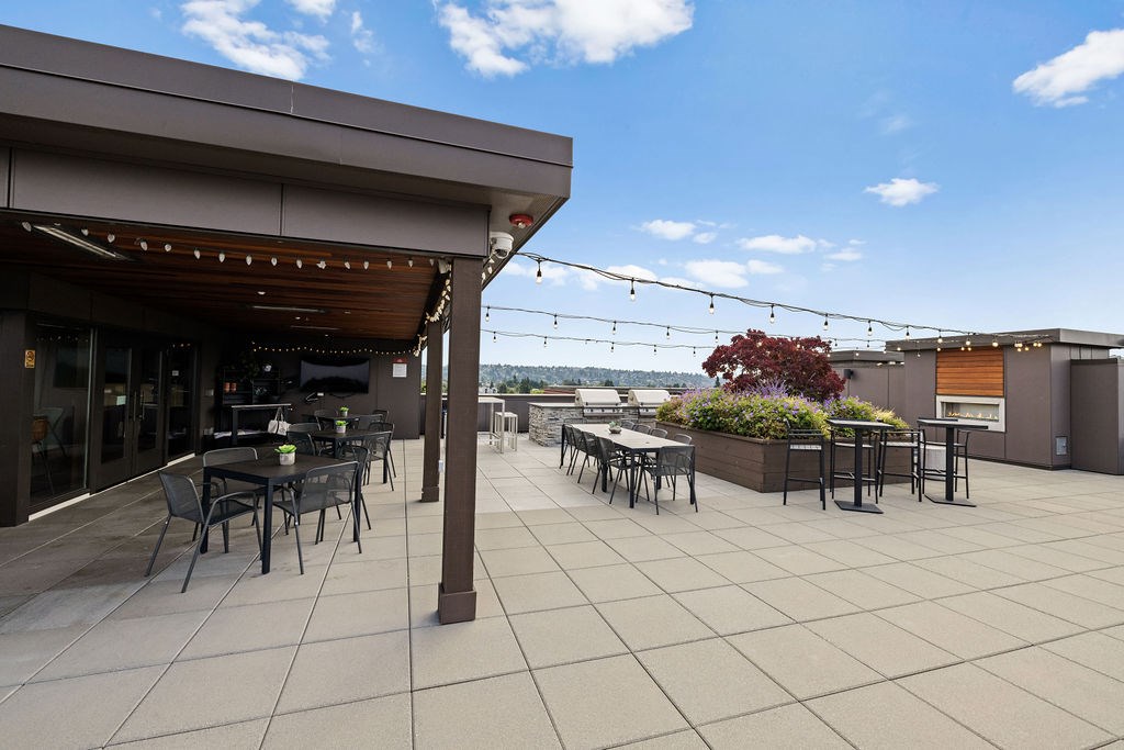 A patio with tables and chairs is shown.