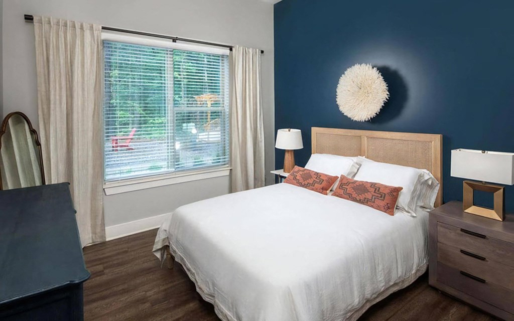 Large Windows Allow In Plentiful Natural Light Featuring Blinds