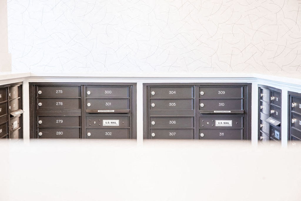 a set of drawers and filing cabinets in a room