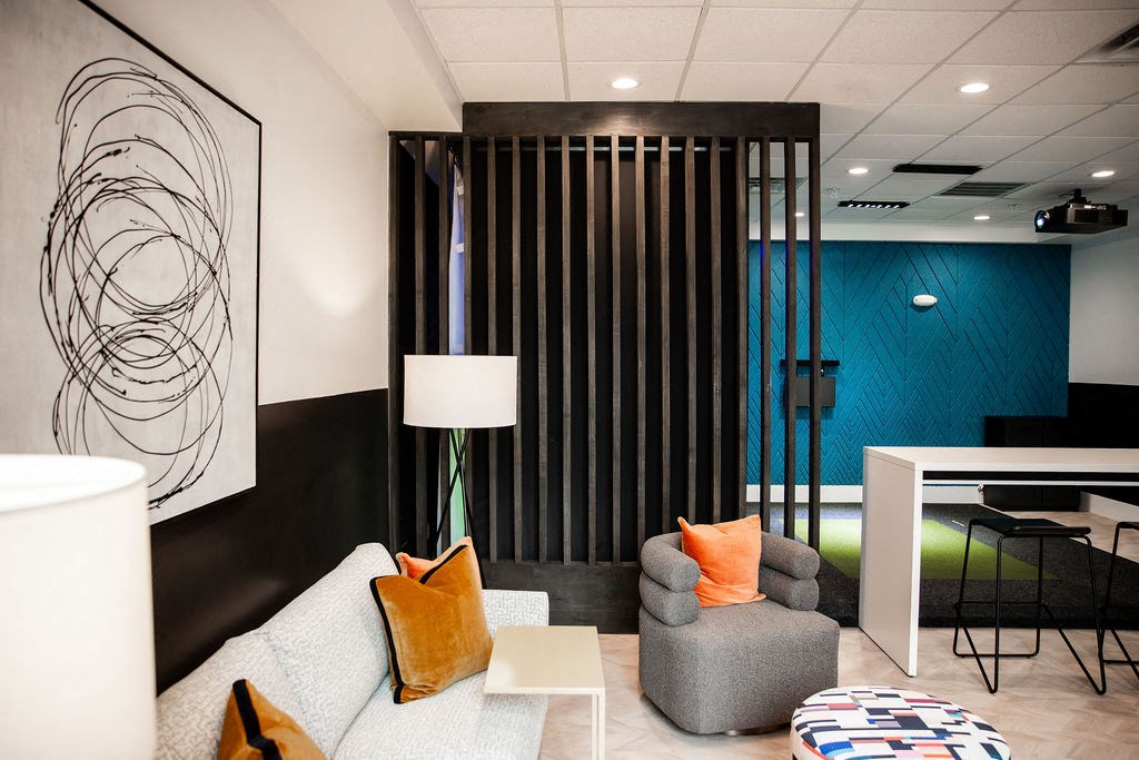 a living room with a couch and a table