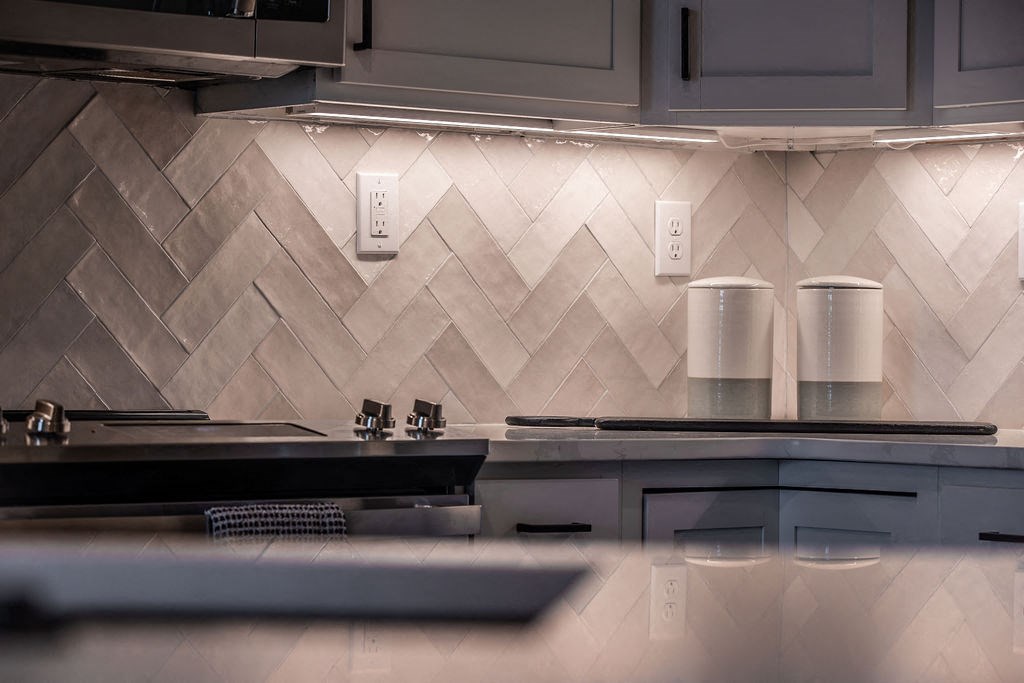 a kitchen with a counter top and a sink