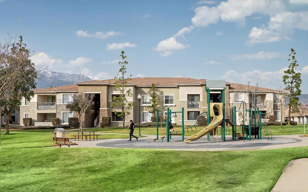 On-Site Play Area with Picnic Benches and Scenic Community Views On-Site Play Area with Picnic Benches and Scenic Community Views