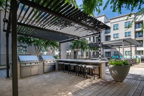 Outdoor Kitchen with Covered Grilling Stations