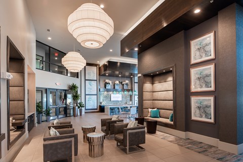 Modern Welcome Lobby with Gathering Spaces and Designer Lighting