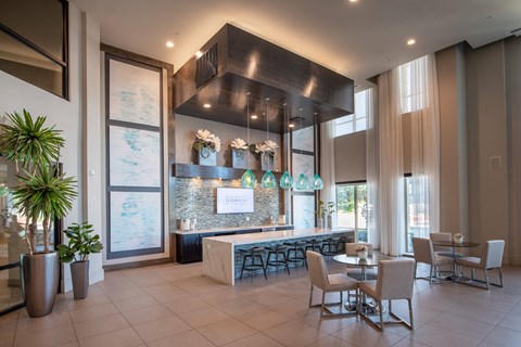 Lobby with Coffee Station, Pendant Lights, and Lounge Tables