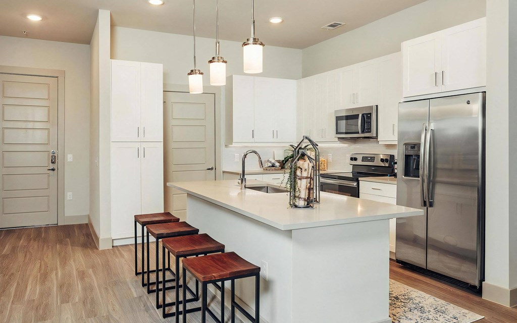Spacious Kitchen with Island Including Breakfast Bar