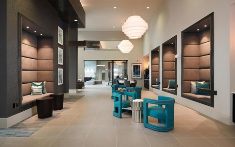 Clubhouse Lounge Featuring Cozy Alcoves, Plush Seating, and Designer Lighting