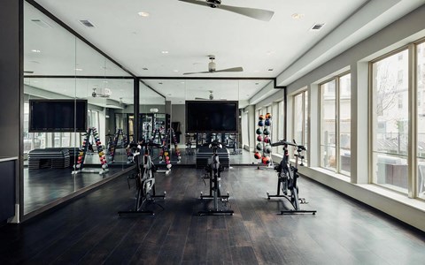 Private Fitness Studio with Indoor Cycling Equipment and Strength Accessories