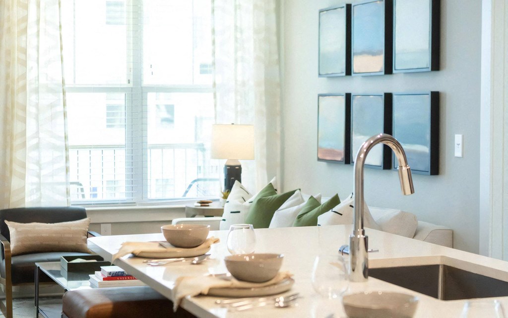 Side-by-Side Front-Load Washer and Dryer with Wire Shelf Above