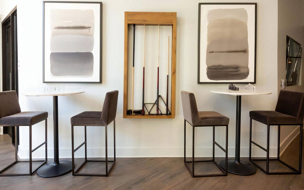 Common Area with Chess Board, High Chairs, and Decorative Wall Art
