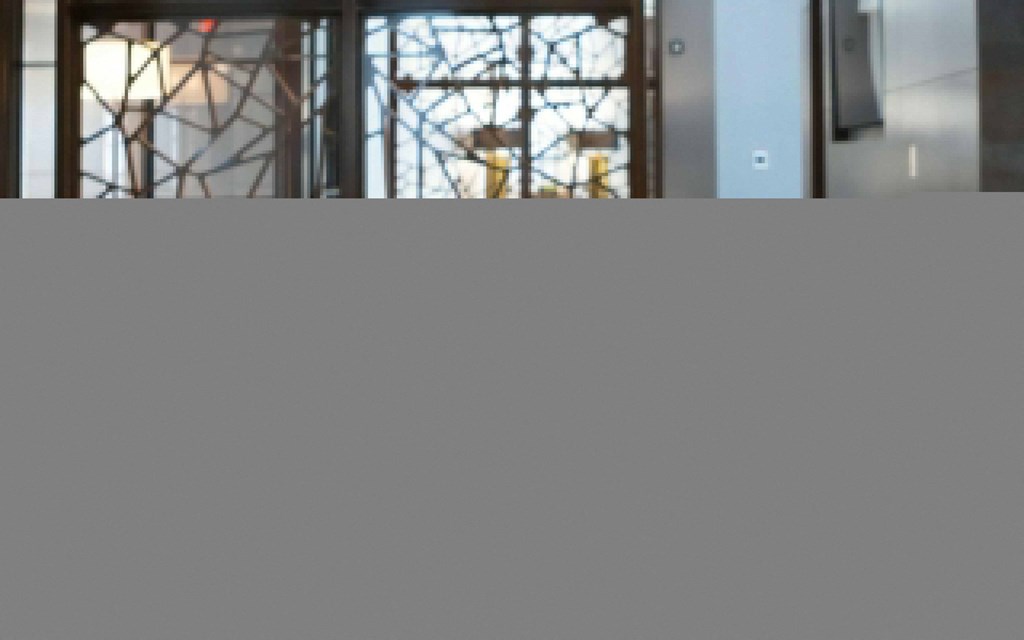 Community Clubhouse Featuring Green Felt Game Table and Seating