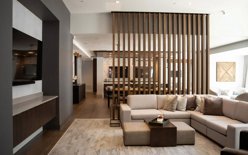 Clubhouse Lounge Featuring Sectional Seating and Decorative Screen