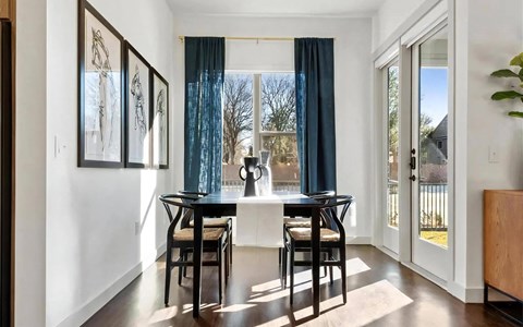 Four-Seat Dining Table Next to Sliding Glass Doors and Window Four-Seat Dining Table Next to Sliding Glass Doors and WindowFour-Seat Dining Table Next to Sliding Glass Doors and Window