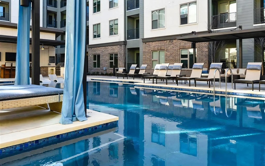 Swimming Pool with Chaise Loungers