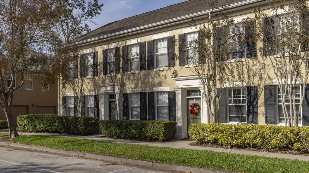 Classic Colonial-Style Residences at Enders Place at Baldwin Park with Tree-Lined Walkways