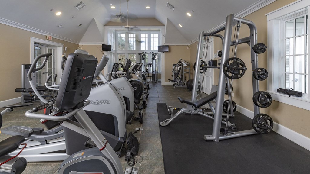 Fully Equipped Fitness Center with Ellipticals and Weight Machines