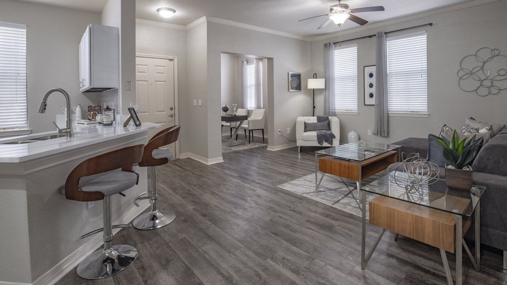 Modern Open Concept Living Room with Breakfast Bar and Wood-Style Flooring